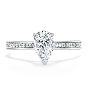 0.75 CT Pear Cut Solitaire Engagement Ring With Channel Pave Setting 1