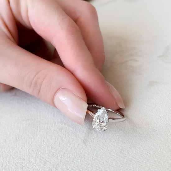 1.5 CT Pear Hidden Halo Moissanite Engagement Ring 9